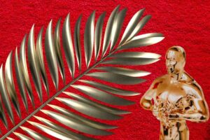 Palma d'oro e statuetta degli Oscar insieme