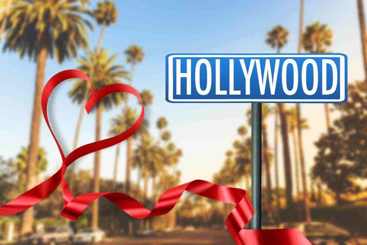 Panorama Hollywoodiano con le palme tipiche, un nastro rosso sulla sinistra forma un cuore