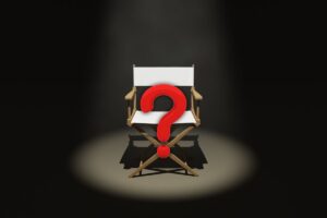 Sedia del regista e punto interrogativo