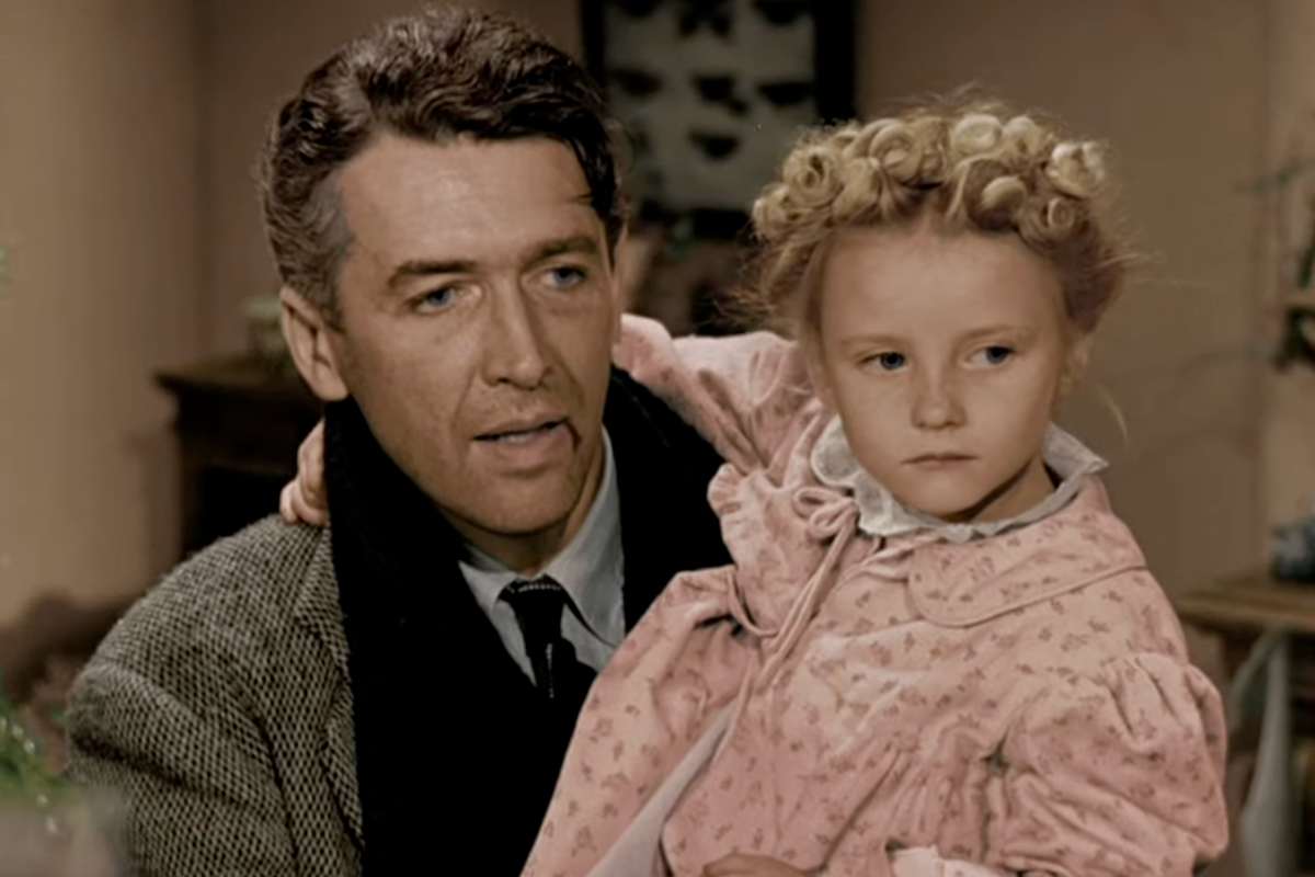 James Stewart con in braccio una bambina