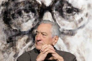 Robert De Niro sullo sfondo Sergio Leone