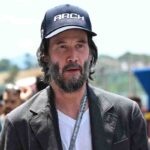 Keanu Reeves con il cappello in testa