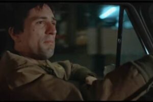Robert De Niro in Taxi Driver guida il taxi
